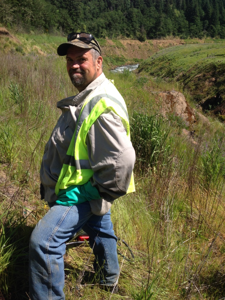 SCNWCP crew member Charlie Bevans works at the former Condit Dam site on the White Salmon River, 2014